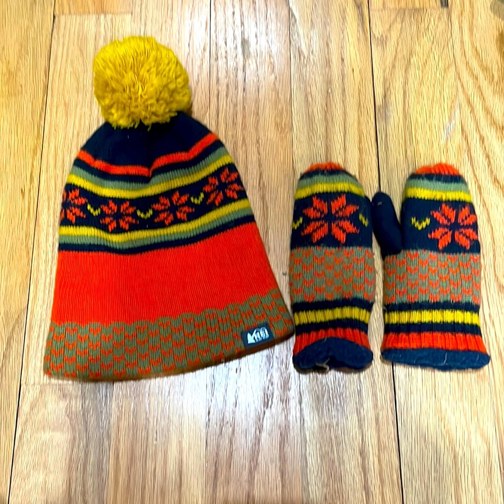 REI matching kid’s Pom Pom hat and mittens